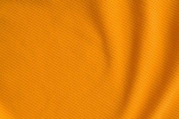Orange color sports clothing fabric jersey football shirt texture top view