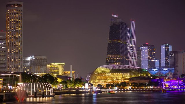 night time illuminated singapore downtown marina bay traffic famous esplanade panorama timelapse 4k 