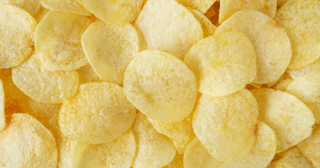 crispy potato chips snack texture background top view