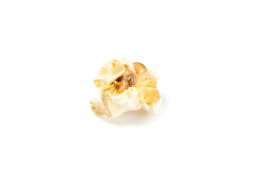 Fototapeta na wymiar Piece of popcorn isolated on white background, close up