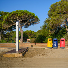 Recycling waste station and beach shower at L'escala Catalonia costa Brava Spain