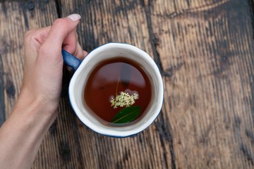 cup of tea on wooden background
