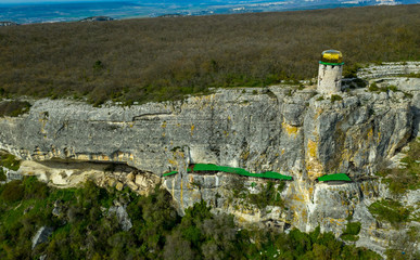 Flying drone above the cave city and monastery Shuldan, near the city of Bakhchisaray, Crimea