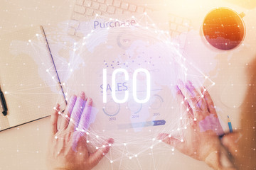 Man's hands working with notes background. Cryptocurrency and finance concept.