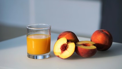 peaches and glass of juice
