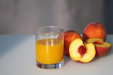 peaches and glass of juice