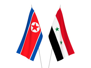 National fabric flags of North Korea and Syria isolated on white background. 3d rendering illustration.