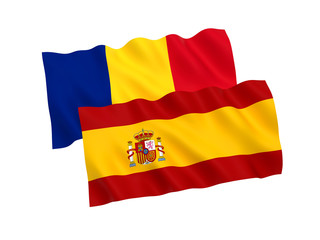 National fabric flags of Romania and Spain isolated on white background. 3d rendering illustration. Proportion 1:2