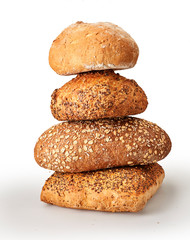Fototapeta na wymiar fresh baked pile of bread isolated on white.