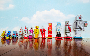 a line of vintage robots from small to big