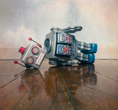 vintage bot lost his head on a old wooden floor