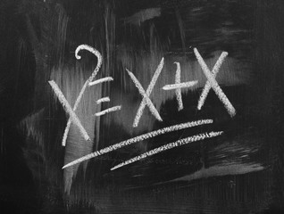 Mathematical equation on black chalkboard, blackboard texture and background