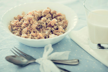 plate with cereal porridge for breakfast