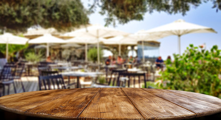 Desk of free space and blurred background of interior 