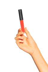 Female hand holding tube with liquid lipstick