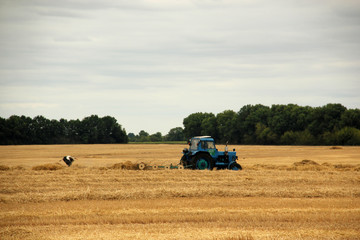 crane running after a tractor