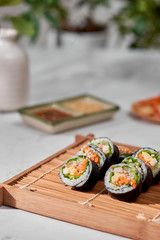 Korean roll Gimbap(kimbob) made from steamed white rice (bap) and various other ingredients