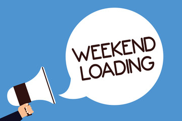 Writing note showing Weekend Loading. Business photo showcasing Starting Friday party relax happy time resting Vacations Man hold megaphone loudspeaker speech bubble screaming blue background
