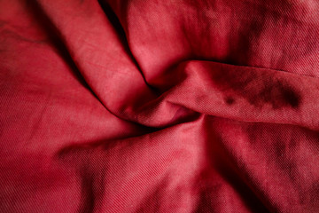 Fototapeta premium Red textile background with texture