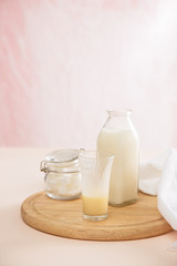 fresh milk in glasses with sugar cubes