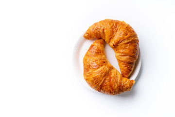 Top view flatlay with two fresh croissants. Morning meal concept. White background