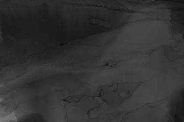 Hand painted black alcohol ink background. Abstract delicate gray texture. Contemporary wallpaper. Fog effect.