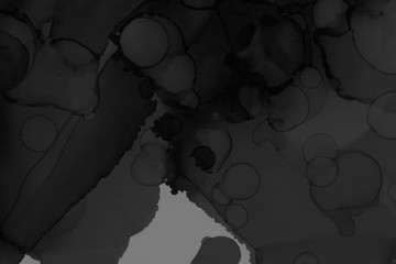 Hand painted black alcohol ink background. Abstract delicate gray texture. Contemporary wallpaper. Fog effect.