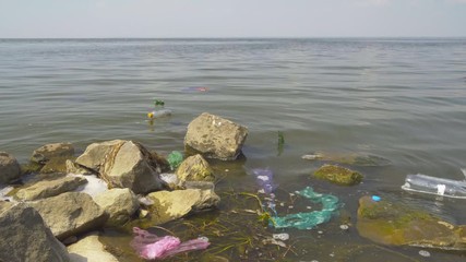 Old trash on the surface of the river 