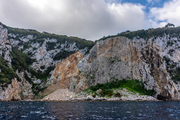 Italy, Capri, view of the coast seen from the sea.
