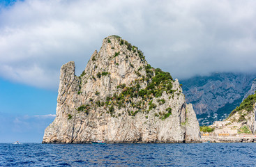 Italy, Capri, view of the faraglioni seen from the sea.