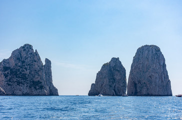 Italy, Capri, view of the faraglioni seen from the sea.