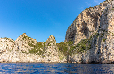 Fototapeta na wymiar Italy, Capri, view of the coast seen from the sea.