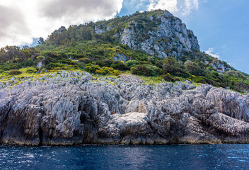 Italy, Capri, view of the coast seen from the sea.
