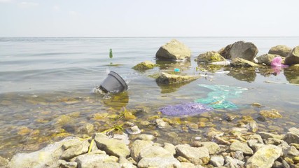 Old trash on the surface of the river 