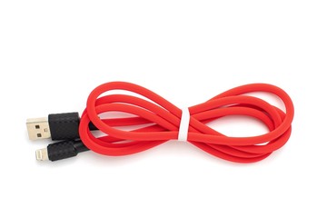 Naklejka premium Red USB cable for smartphone isolated on white background. Top view
