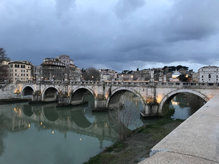 Fototapeta premium Rome, Italy. St. Angel's Bridge in the evening with beautiful lighting