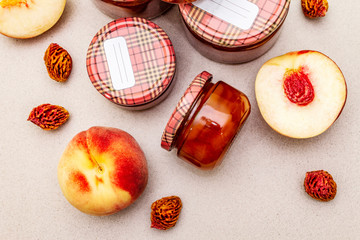 White peach jam, confiture, chutney in a glass jar