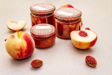 White peach jam, confiture, chutney in a glass jar