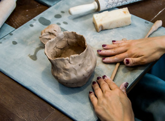 potter with clay in his hands