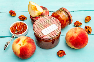 White peach jam, confiture, chutney in a glass jar