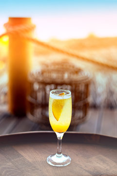 Refreshing orange Mimosa cocktail with champaigne