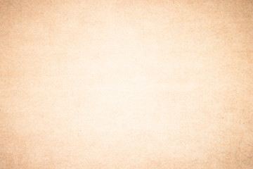 Beige recycled craft paper texture as background. Brown paper texture, Old vintage page or grunge vignette wrapping paper. Design brown retro for interior decoration hardboard.