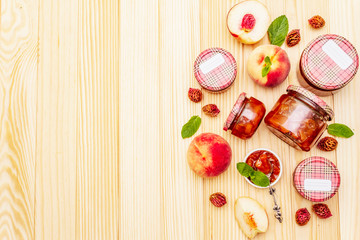 White peach jam, confiture, chutney in a glass jar