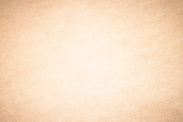 Beige recycled craft paper texture as background. Brown paper texture, Old vintage page or grunge vignette wrapping paper. Design brown retro for interior decoration hardboard.