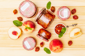 White peach jam, confiture, chutney in a glass jar