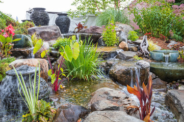 Landscape architecture with waterfall features for summer garden