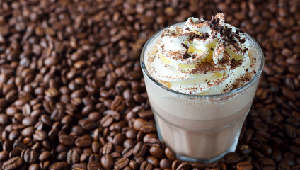 Iced latte coffee with whipped cream