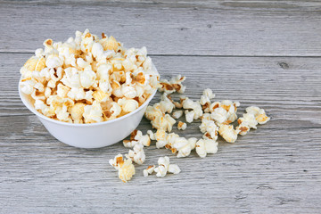 Popcorn on wooden background