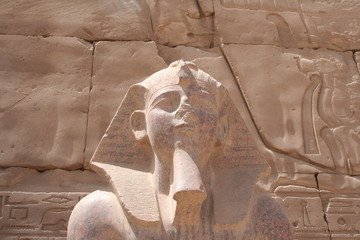 statue of pharaoh at temple of karnak, old egypt