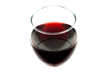 Glass of red wine isolated on white background